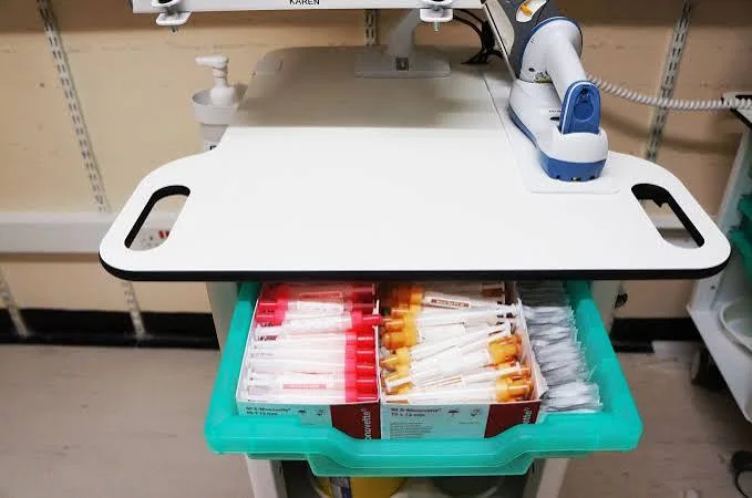 An example of a trolley with blood-test equipment.