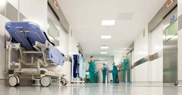 An example of a hospital corridor with a bed trolley.